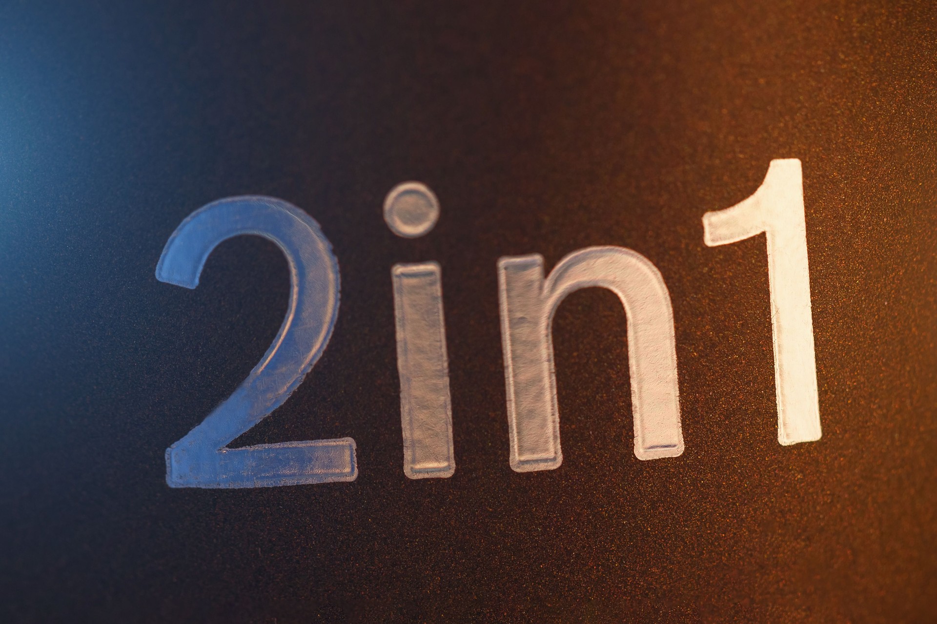 Silver Inscription of 2 in 1 digits on a brown background with side lights.